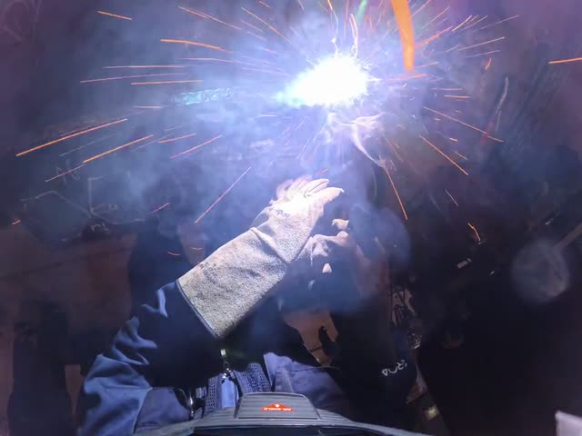 Welding a steel joint, recorded from the worker’s point of view.