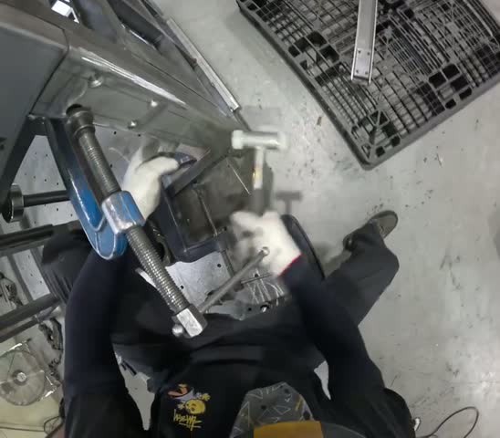 Clamped corner tapping, recorded from the worker’s point of view.